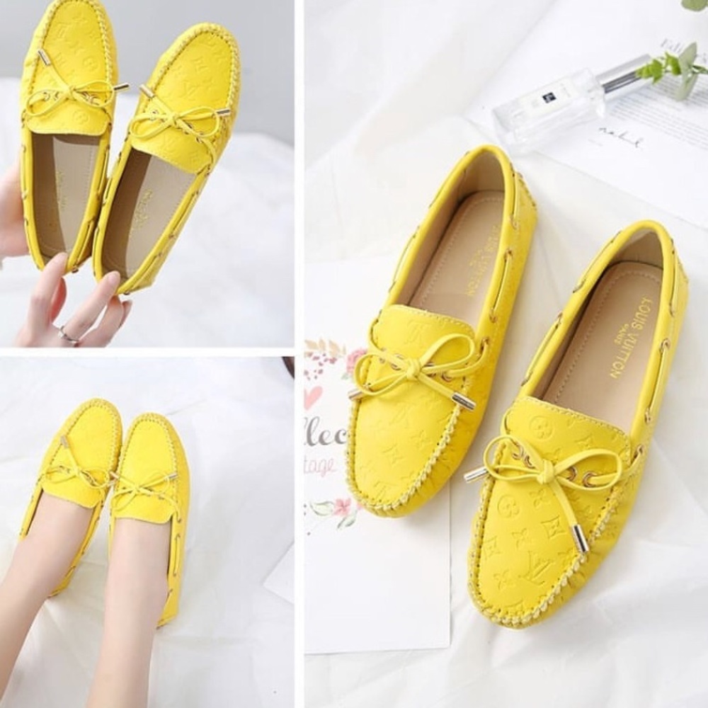 SOLD - Louis Vuitton yellow driving shoes.